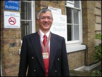 Dr Voi Shim Wong with his medal